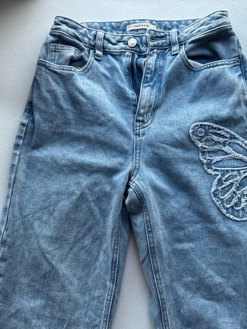 PacSun High-Rise Light Blue Jeans with Butterfly Patch